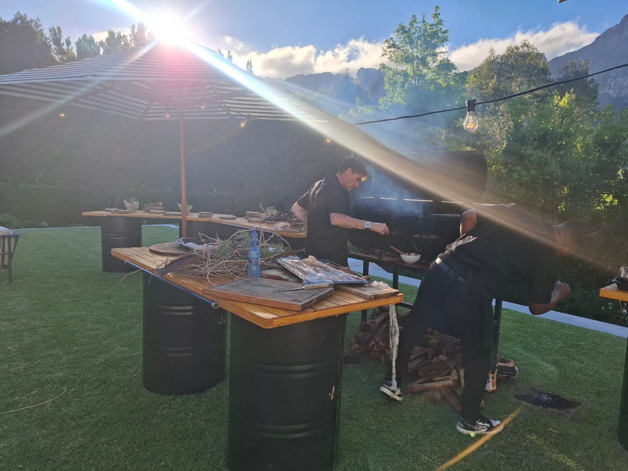 BBQ preparation in evening light